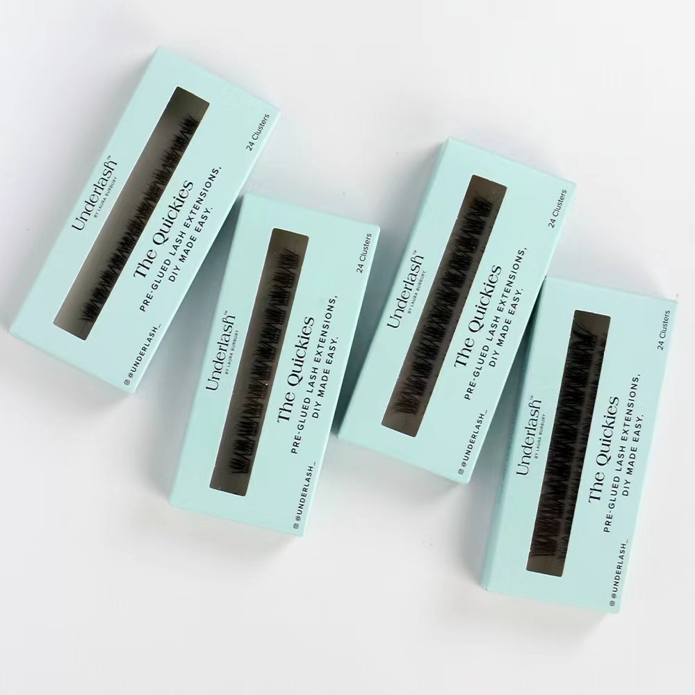 Four boxes of 'The Quickies' eyelash extensions on a white background