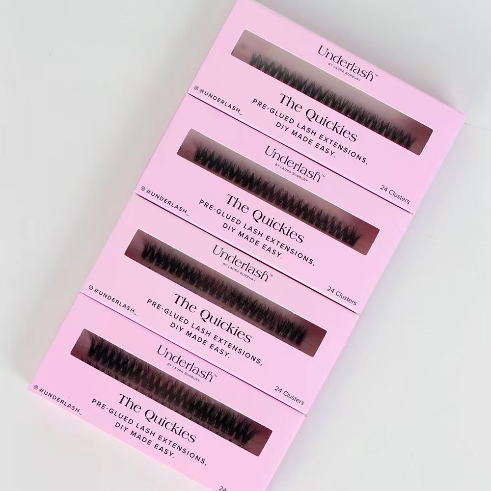 Pink packaging of Underlash The Quickies pre-glued lash extensions on a light gray background