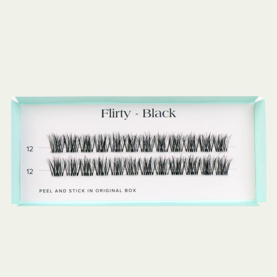 False eyelashes packaging with 'Flirty - Black' text on a light gray background