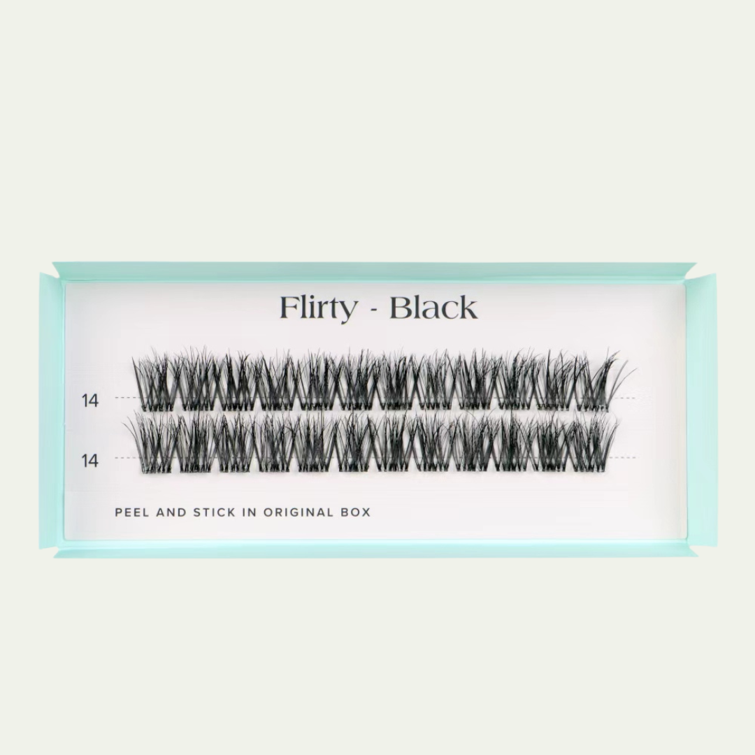 Box of false eyelashes labeled 'Flirty - Black' on a light gray background