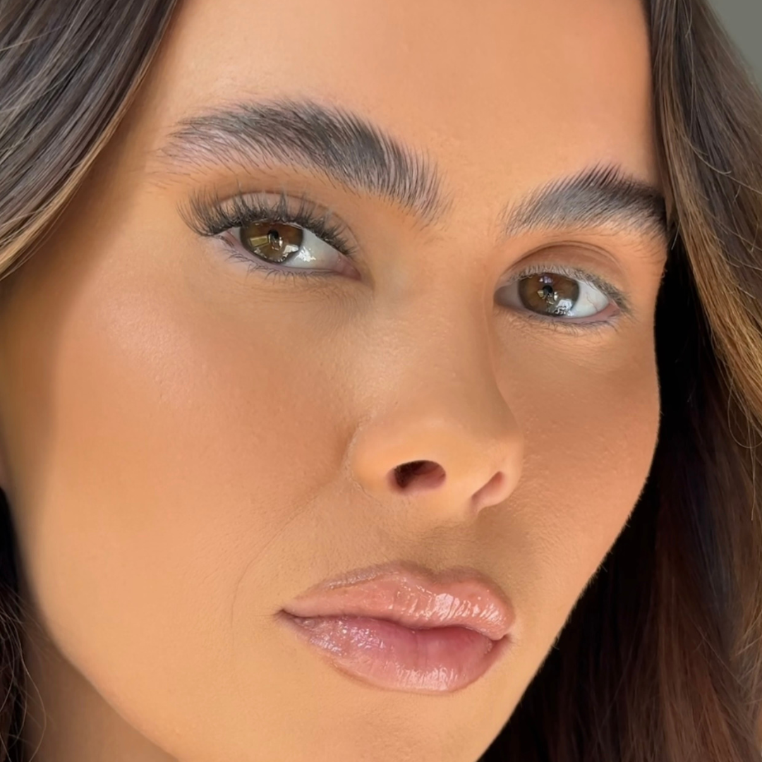 Close-up of a woman's face with a neutral expression