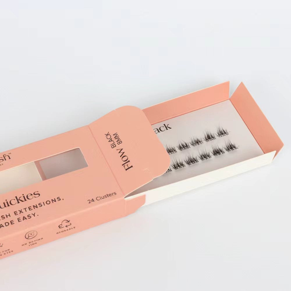 Open box of false eyelashes with a white background