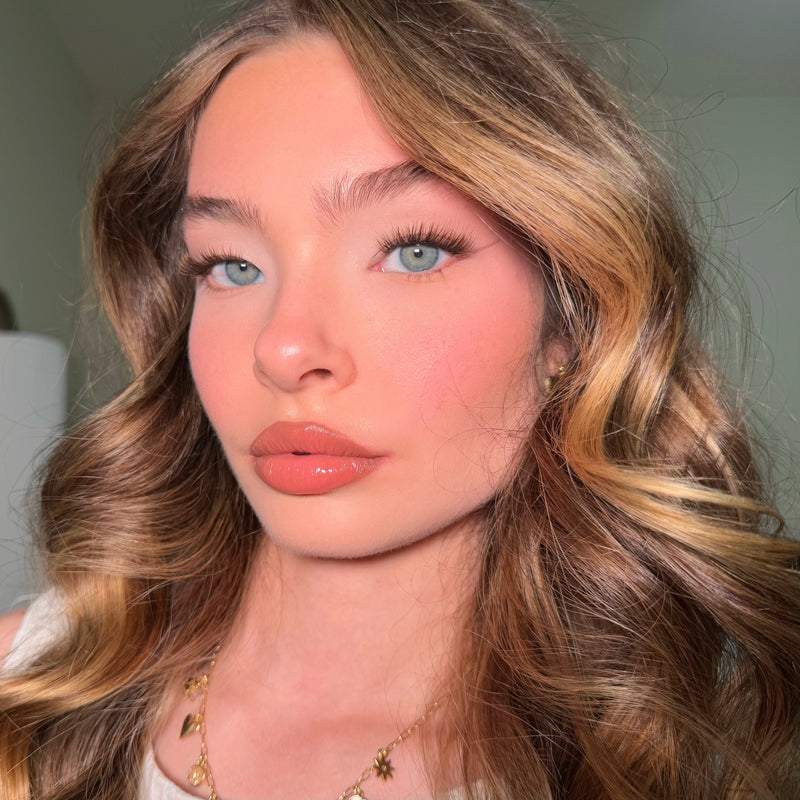 Riley wearing natural lashes in brown