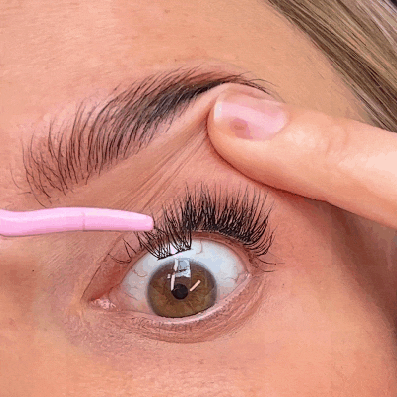 The third step in doing your DIY lash extensions at home with Underlash by Laura Burbury is applying the segmented lashes under the upper lash line.