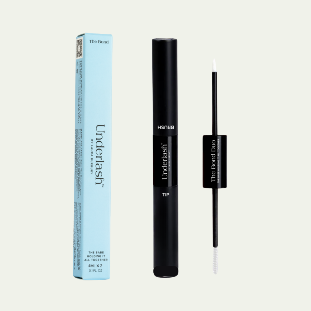 Black eyelash product with packaging on a light gray background